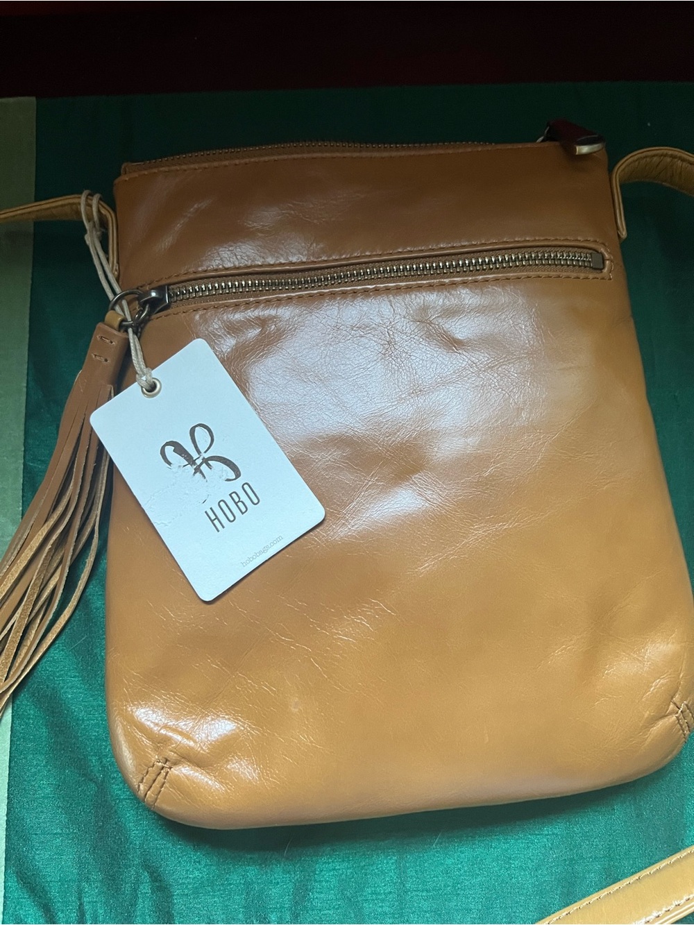 NWT HOBO Genuine Leather Zip Top Crossbody Bag with Tassel
